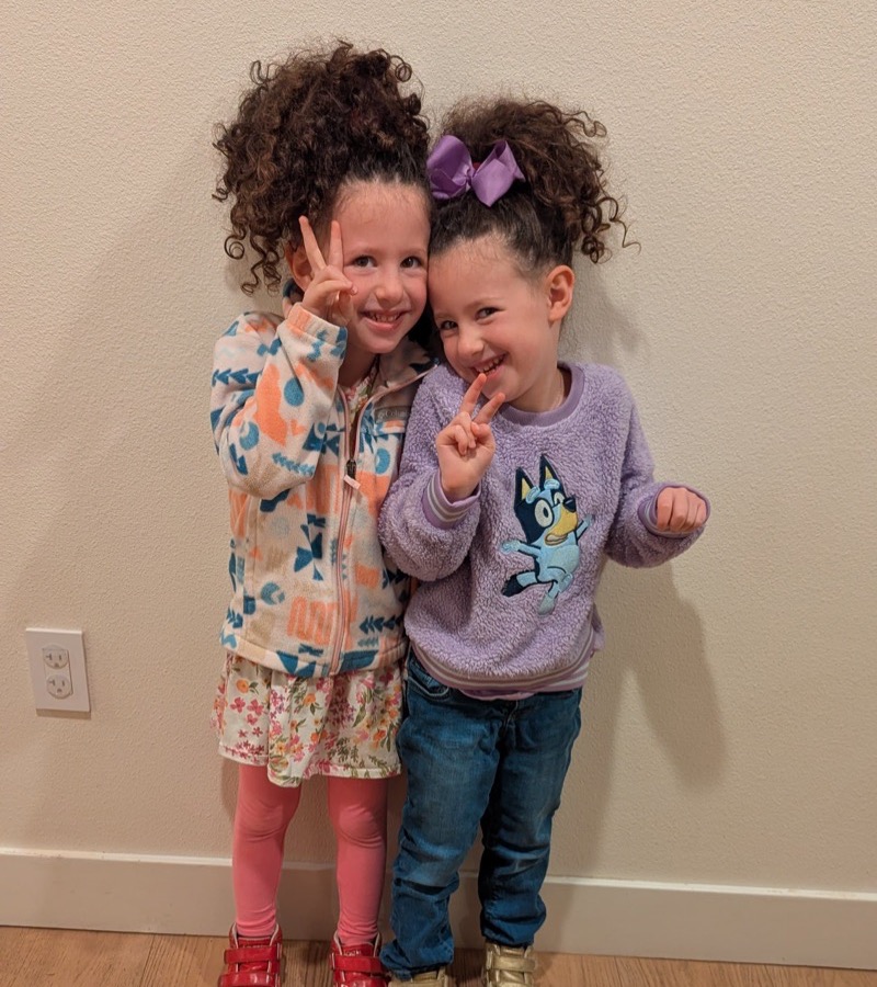 Alice and Emily doing peace signs